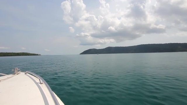 Sailing on rough seas, view in the front of speed boat through koh kood island, Thailand