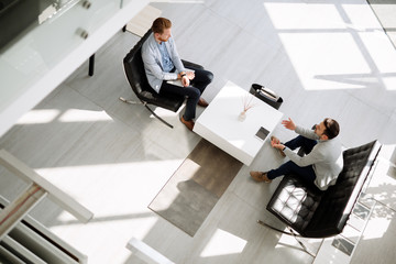 Business meeting in lobby