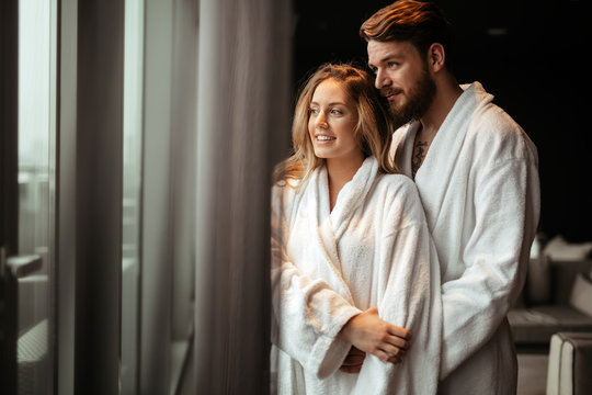 Couple relaxing in bathrobe