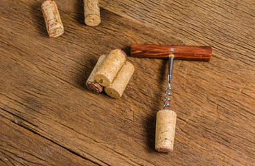 Fototapeta na wymiar corkscrew on wooden background