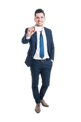 Full body of cheerful young businessman showing blank business c