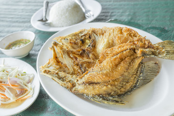 Deep Snapper Fried with fish sauce the delicious favorite menu Thai sea food.