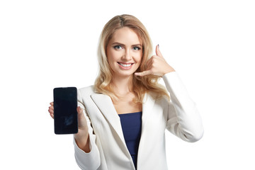 Business smiling woman showing a display of phone and making a call me sign
