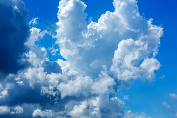 White fluffy clouds in the blue sky