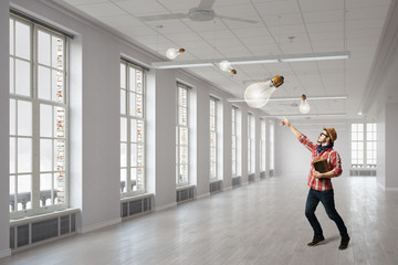 Fototapeta premium Hipster guy with book in hands