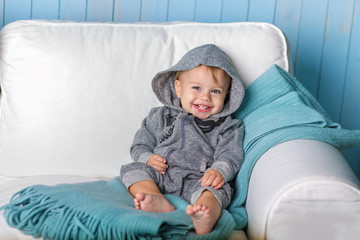 Image of  sweet baby boy, closeup portrait of child isolated on white background, cute toddler with blue eyes