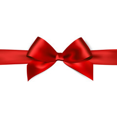 Shiny red satin ribbon on white background