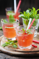 Strong alcohol cocktail with rum and mint