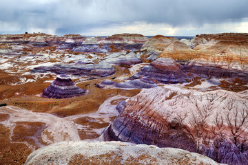 Stunning striped purple sandstone formations of Blue Mesa badlands in Petrified Forest National Park