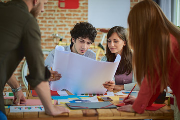 Group of Architects working in modern start up office