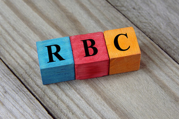 RBC (Red Blood Cells) acronym on wooden background