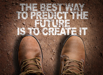 Top View of Boot on the trail with the text: The Best Way to Predict Your Future is to Create It