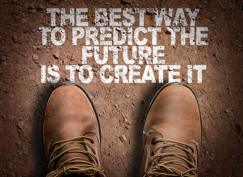 Top View of Boot on the trail with the text: The Best Way to Predict Your Future is to Create It