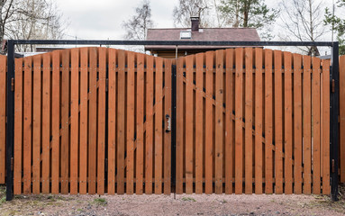 brown wooden gate in the village
