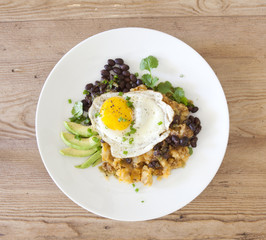 Fried Egg with Chorizo Potatoes and Black Beans