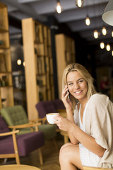 Young woman drinking coffee