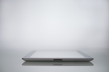 Workspace Designer Smartphone and tablet computer on a mirrored table