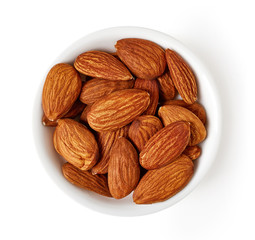 Bowl of almonds isolated on white, from above