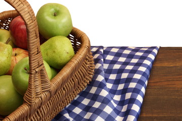 Fresh Apples In The Wicker Basket On Rustic Wood Table