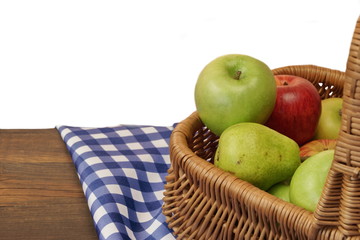 Fresh Apples In The Wicker Basket On Rustic Wood Table