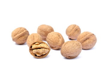 Walnuts in shell isolated on white background
