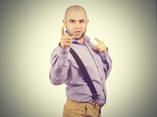 funny arrogant bald man with a beard.