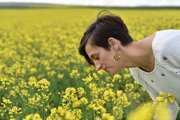 Fototapeta premium Portrait of a young hipster girl in the nature