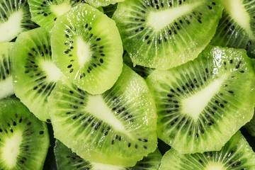 Green kiwi food background, top view