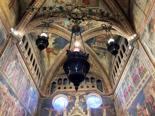 Inside beautiful and ornate Italian cathedral ceiling 