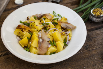 salad with potato and smoked fish