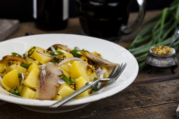 salad with potato and smoked fish