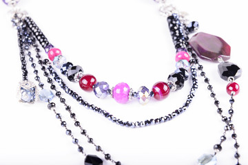 women's jewelry, beads and necklace isolated on white