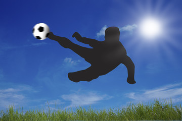 Fototapeta na wymiar Voller Einsatz im Fussball bei schönstem Fussballwetter