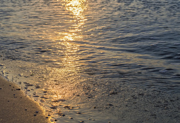 Oceanside, wave and solar path on the water