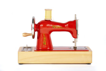 Vintage manual sewing machine on white background