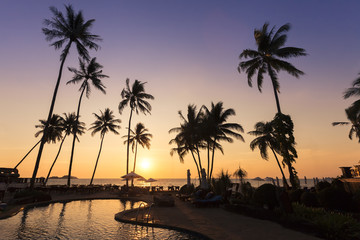 Fototapeta na wymiar Relaxing sunset light, tropical hotel and resort near the beach