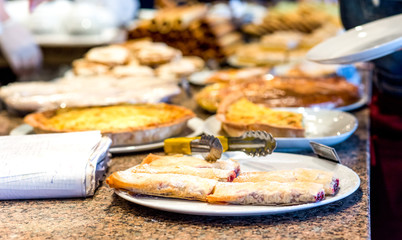 different types of sweet pastries on plates