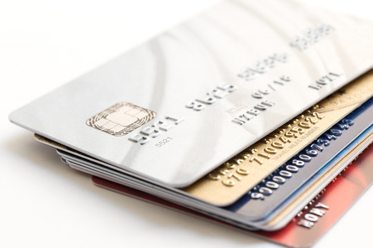 Pile Of Credit Cards On White Background