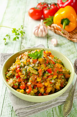 Grilled vegetables salad with yellow and red bell pepper, eggpla