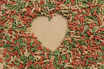 Corazón de madera y muchos colores 