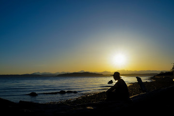Female At Beach In Thought Silhouette