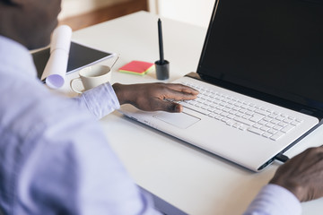 Young African Businessman Working.