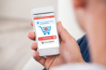 Person's Hand Holding Mobile Phone