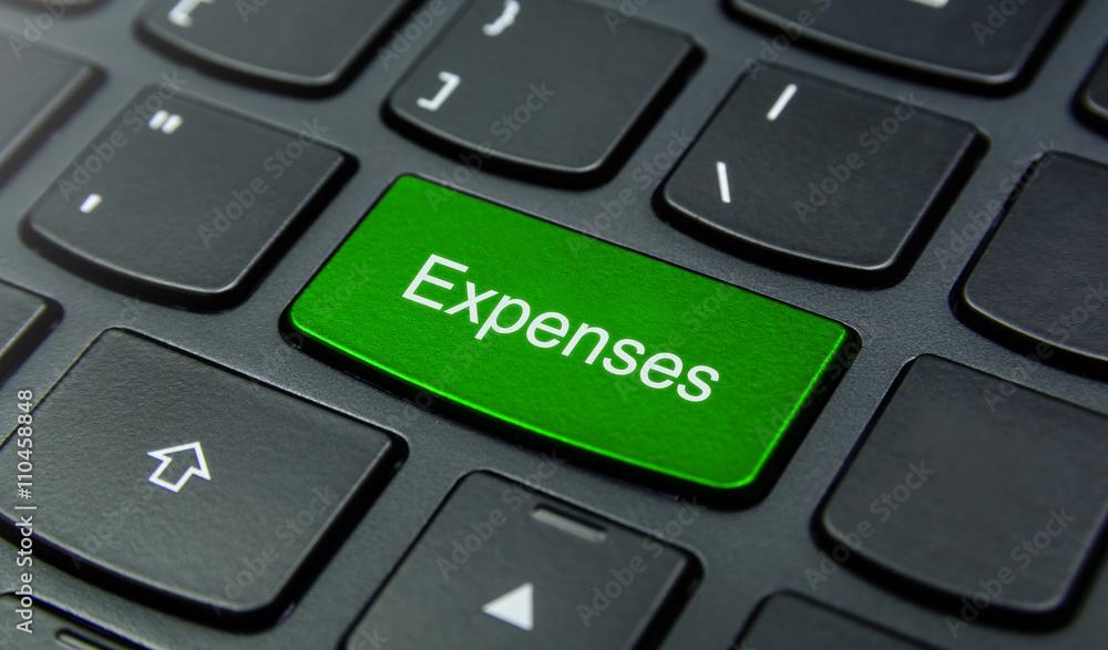 Aufkleber business concept: close-up the expenses button on the keyboard and have lime, green color button iso