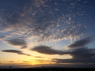 Obraz na płótnie Canvas Beautiful clouds and dramatic sunrise sky background