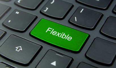 Business Concept: Close-up the Flexible button on the keyboard and have Lime, Green color button isolate black keyboard