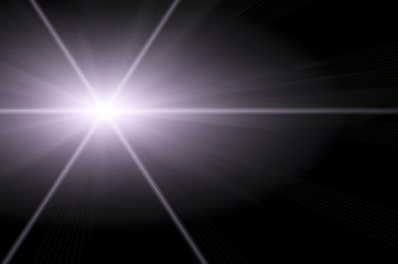 Abstract lens flare light over dark background