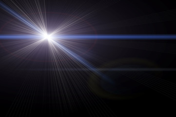 Abstract lens flare light over dark background