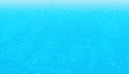 Clean water in blue swimming pool.