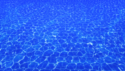 Clean water in blue swimming pool.